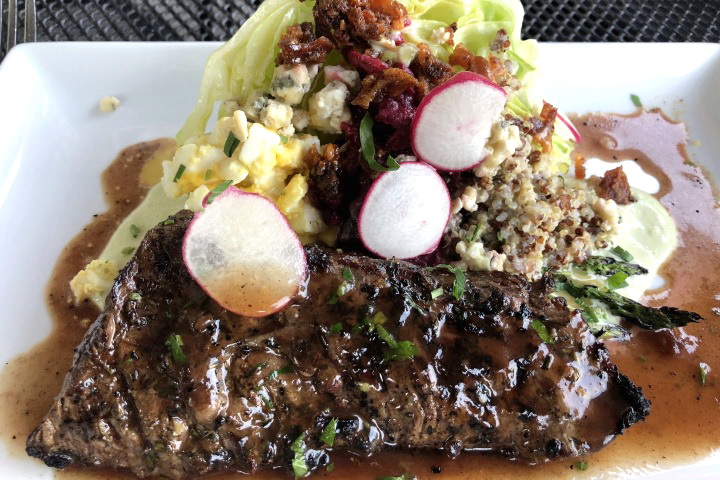photo of salad with skirt steak from Moonshine 152, South Boston, MA