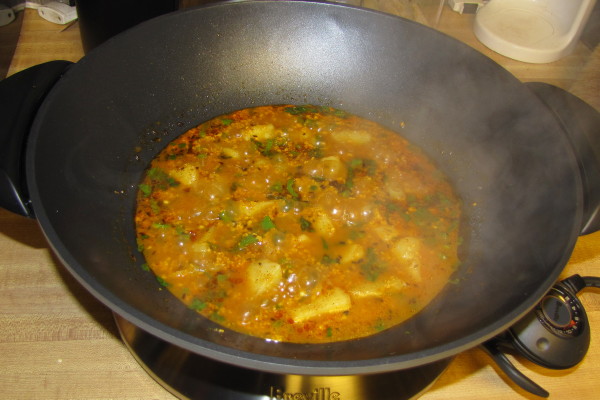 photo of homemade potatoes in yogurt sauce