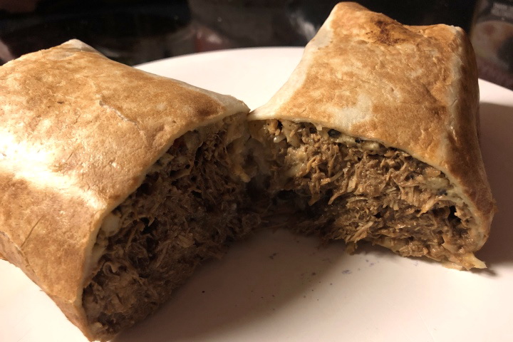 photo of a mole poblano burrito from Villa Mexico, Boston, MA